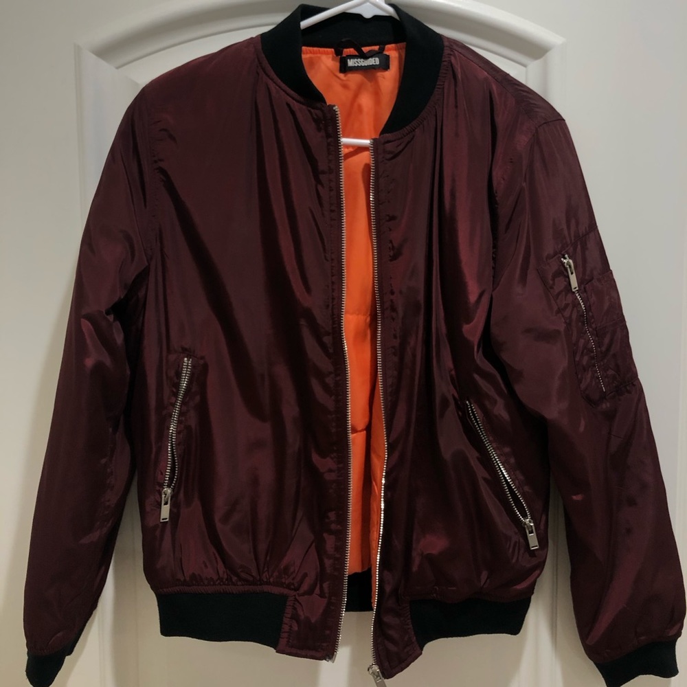 Misguided burgundy bomber with orange interior